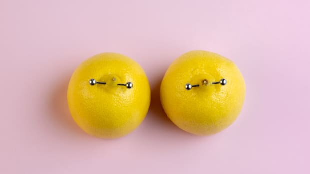 pierced lemons that represent pierced nipples.